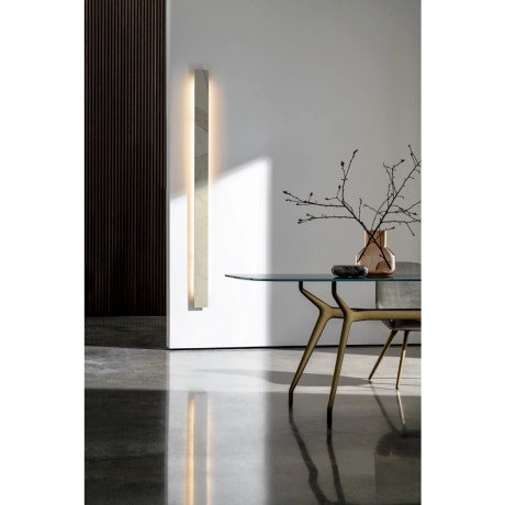 Arkos Oval Shaped 02 table with transparent glass top and gold base.