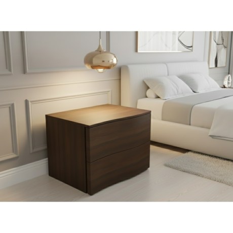 Spot bedside table in a dark wood finish with curved drawers.