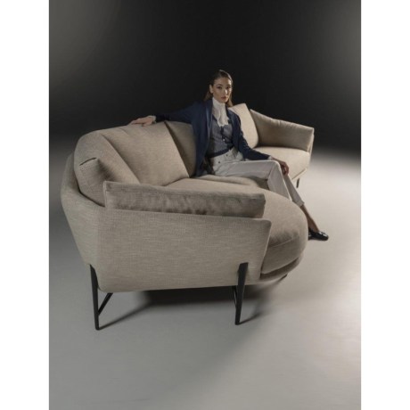 Venere corner sofa by Calia Italia with round daybed invested with modern fabric and elegant black feet.
